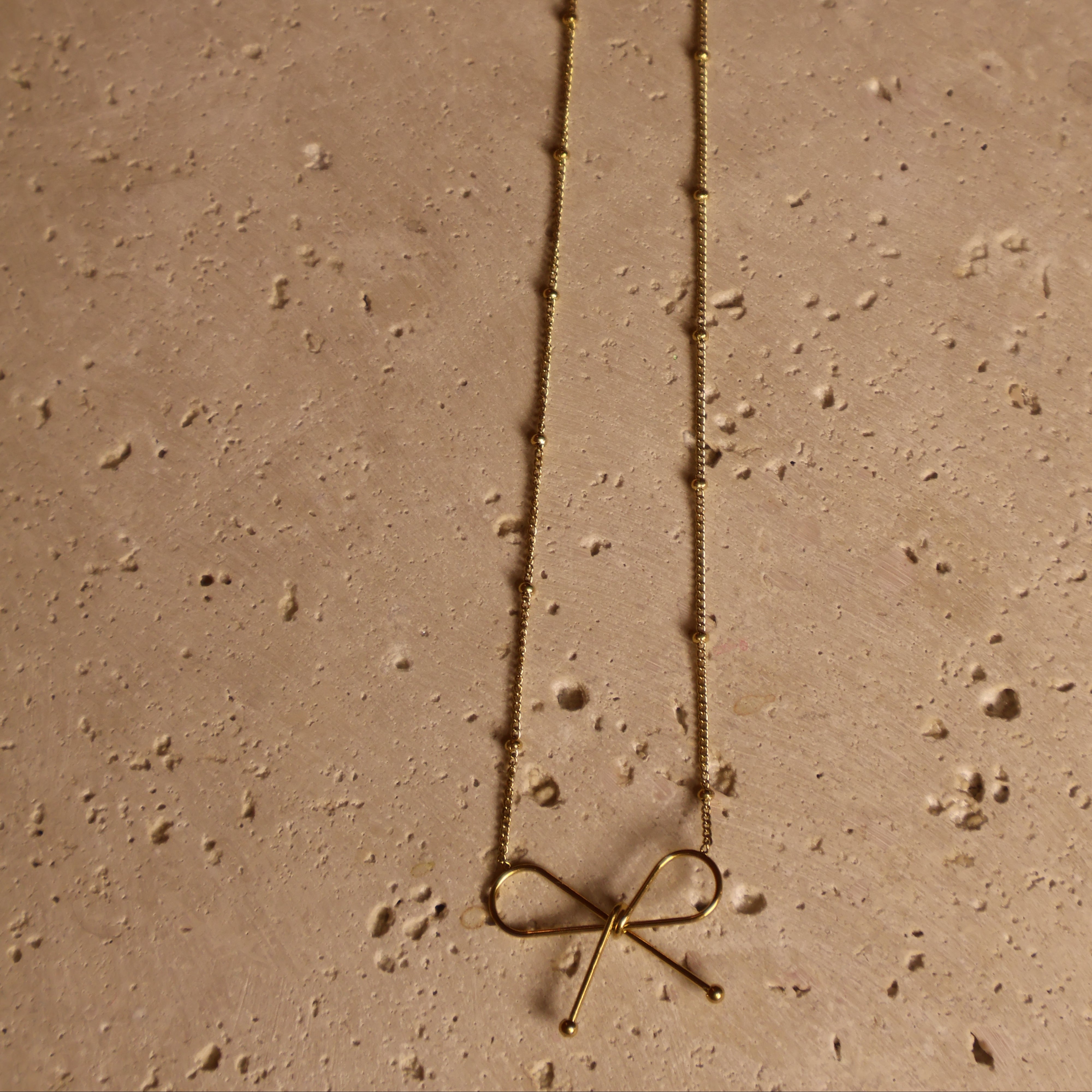 bow necklace